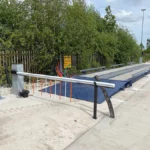 Weighbridge with Rising Arm Barriers being Installed